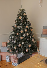 Christmas tree with gifts around