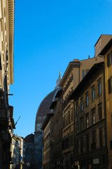 View from the street to florence cathedral st peters basilica di santa maria del fiore under clear winter sky