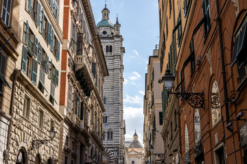 old church tower photographed in the streets of genua, italy