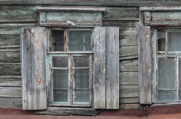 Obraz na płótnie Canvas Windows of an old house