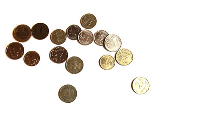 Several Russian coins lie on a white isolated background. Shiny Russian metal money. Place for text.