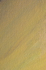 Yellow paint on canvas