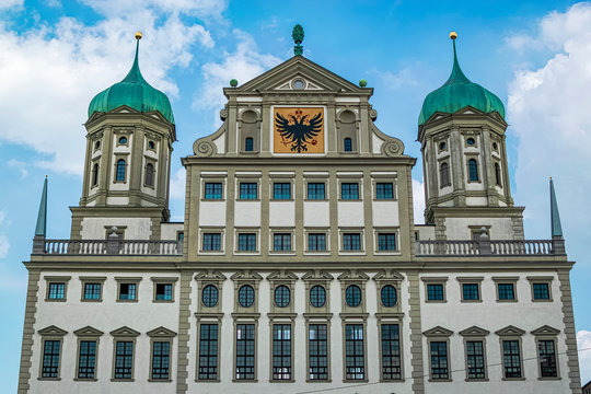 New Detail of the upper facade of the Augsburg City Hall and the shield of the city. Photography taken in Augsburg, Bavaria Germany.