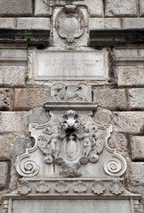 Beautiful decoration on the walls of the old town of Kotor.