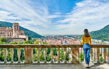 Tourist in Heidelberg town on Neckar river in Baden-Wurttemberg, Germany