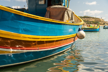 view of the harbor with boats, of marsaxlokk on malta