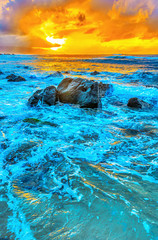Obrazy na Szkle  zachód słońca nad północnym brzegiem Oahu na Hawajach