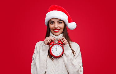 Happy young woman waiting for New Year