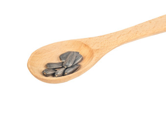 Sunflower seeds in a spoon