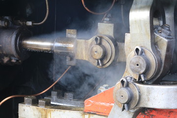Piston and pipes with steam, locomotive engine