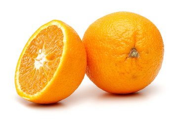 Whole and half orange fruit isolated on white background