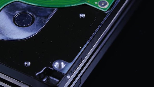 Macro close up of computer hard drive roating around