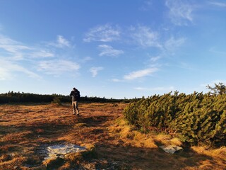 man on top of mountain