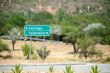 A road sign situated between Santiago and Valparaiso, clearly indicating the directions to both...