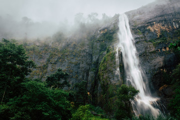 Fototapeta na wymiar waterfall in the mountains - Scene of amazing Diyaluma waterfall in Sri Lanka