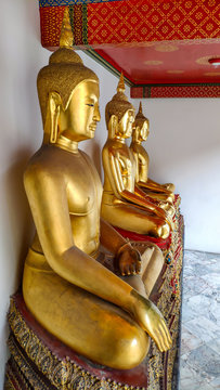 Golden Buddha Statue in Wat Pho Temple.  Wat Pho is one of the oldest temples in Bangkok, Thailand
