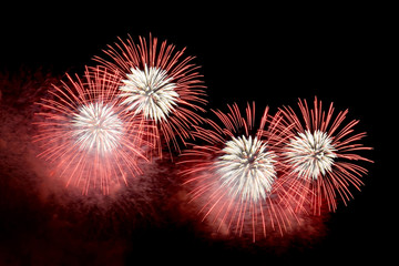 Flashes of red and white fireworks