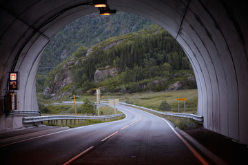 Mountain road in Norway, exit from the tunnel