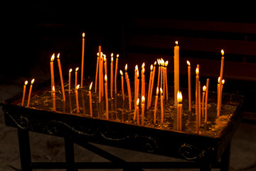 Burning candles in the Orthodox church, Armenia
