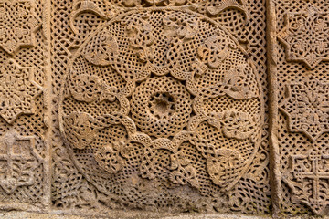 The amazing carved patterns on the medieval khachkars, created by 13th century carver Pavgos in Goshavank Monastery, Gosh, Armenia.