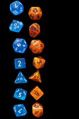 2 RPG sets orange/blue for playing role playing games on black background.
