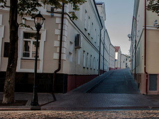 Sights and views of Grodno. Street of the old city. Cobbled roadway.