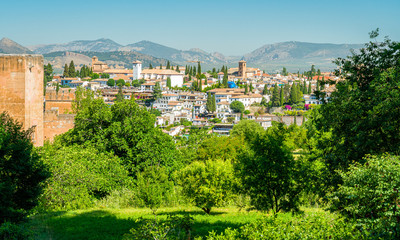 Fototapeta na wymiar Panoramic sight with the Alhambra Palace and the Albaicin district in Granada. Andalusia, Spain.