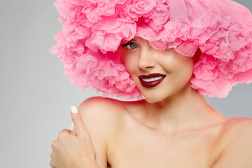 Woman Big Hat and Lips. Model wearing Fabric with lace ruffles hat. High Fashion Model fabric crown...