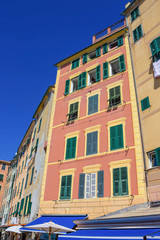 Fototapeta na wymiar Colorful buildings at Camogli on sunny summer day, Liguria