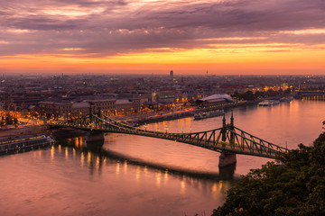 Fototapeta na wymiar The Liberty Bridge of Budapest from Gellert Hill before sunrise.