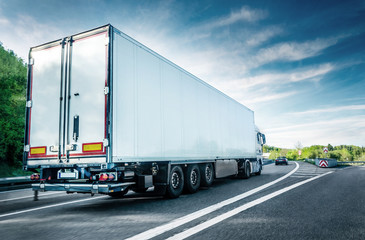 Obraz na płótnie Canvas White truck on german highway