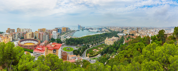 A cityscape. View of the city,  Malagueta Bullring, port and the Cathedral from the Gibralfaro viewpoint