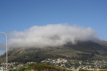 Mountain with clouds rolling over
