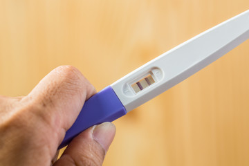 Positive pregnancy tester close up