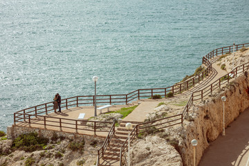 romantic couple next to the sea