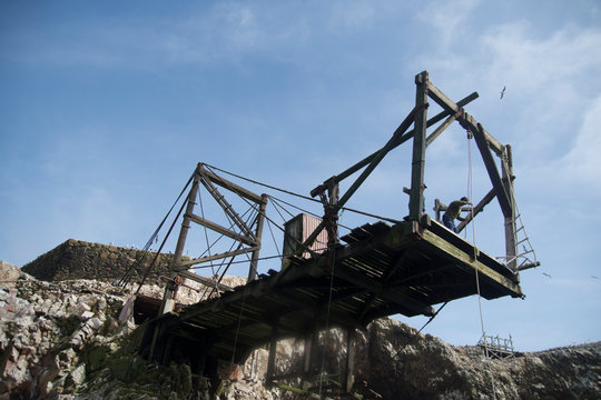 Guano collectors in Ballesta Islands, Peru