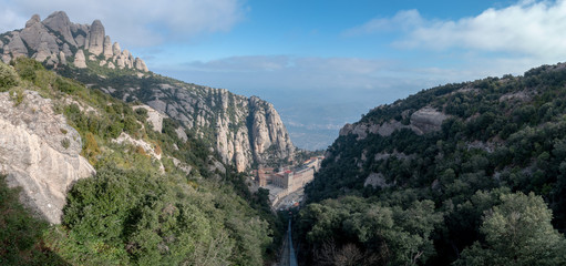 Fototapeta na wymiar A panoramic view of Santa Maria de Montserrat Abbey near Barcelona, Spain