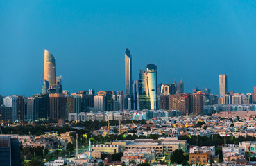 Abu Dhabi skyline view of modern buildings at blue hour