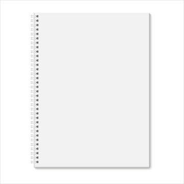 Blank closed spiral notebook isolated on white background.