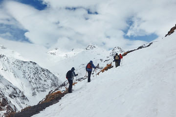 The group goes to the mountains to make the climb