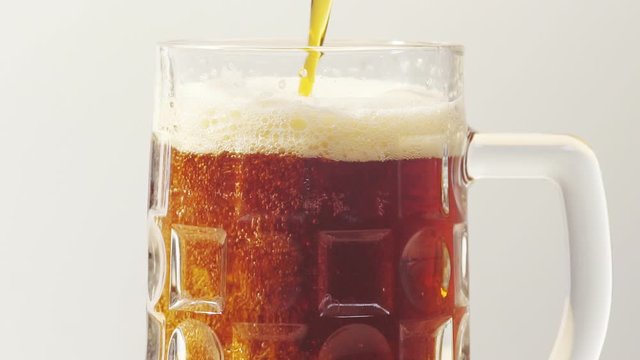 Pouring beer into a glass