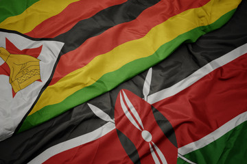 waving colorful flag of kenya and national flag of zimbabwe.