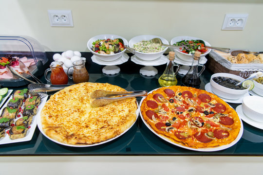 Food And Buffet Decoration With Pizza And Lots Of Dishes In A Hotel