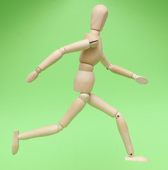 Wooden dummy man on white background