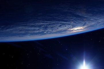 Sunrise on Earth in Space Elements of this image were furnished by NASA.