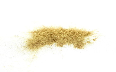 gold glitter powder on white background