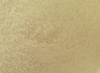 gold glitter powder on white background