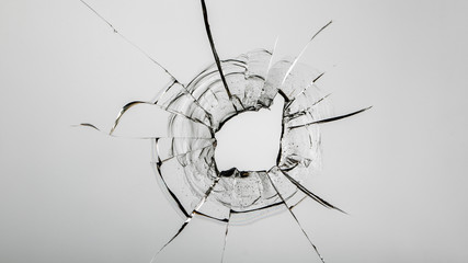 hole from a ball on a white background