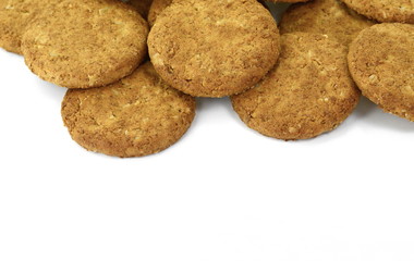 Fototapeta na wymiar Round whole wheat biscuit, cookie with raisins isolated on white background. Biscuits with whole-wheat (wholemeal) flour isolated on white background 