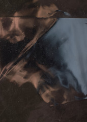 glossy polyethylene texture with bruises and dust